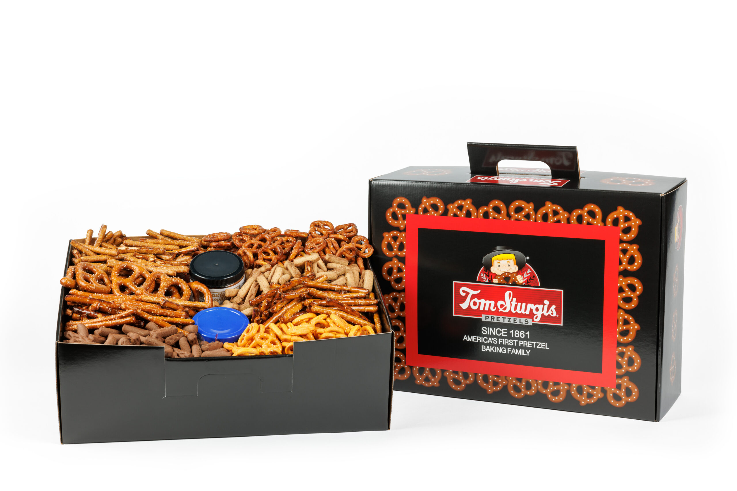 Black and red tote box with pretzels and a jar.