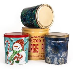 3 Tins Displays next to each other with one on top.